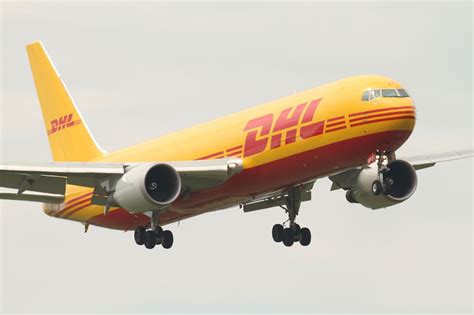 dhl express increases fleet capacity  boeing converted freighters