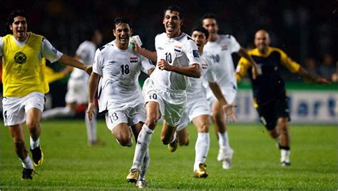 with eyes fixed on a distant soccer field iraqis leap at a reason to