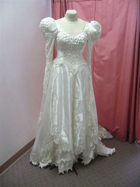 white satin puffy sleeve princess wedding  bridaldiscoveries  wedding dresses