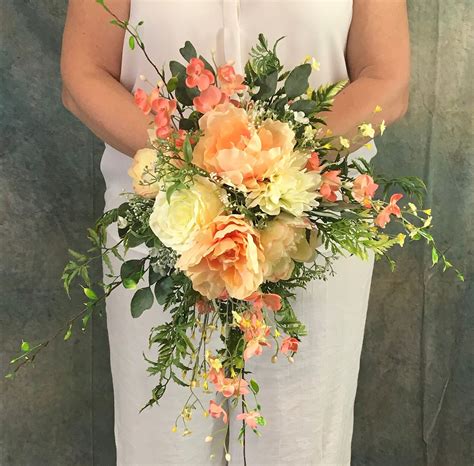 ultra romantic coral and soft yellow silk cascading bridal bouquet coral