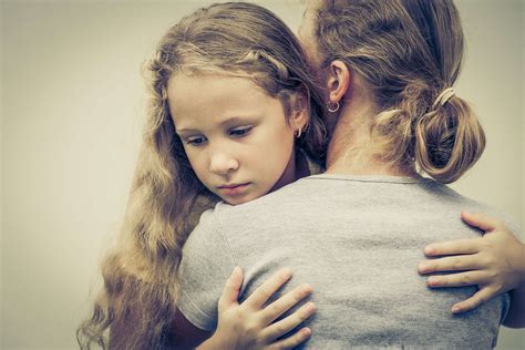 portrait   sad daughter hugging  mother coffee  carpool