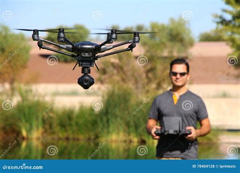 man flying  high tech camera drone stock photo image  delivery airplane