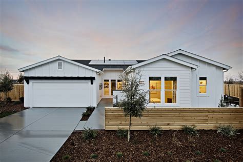 white siding single story exterior  black accents white