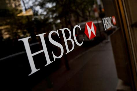 hsbc  pre tax profit falls  flags challenging revenue outlook banking finance