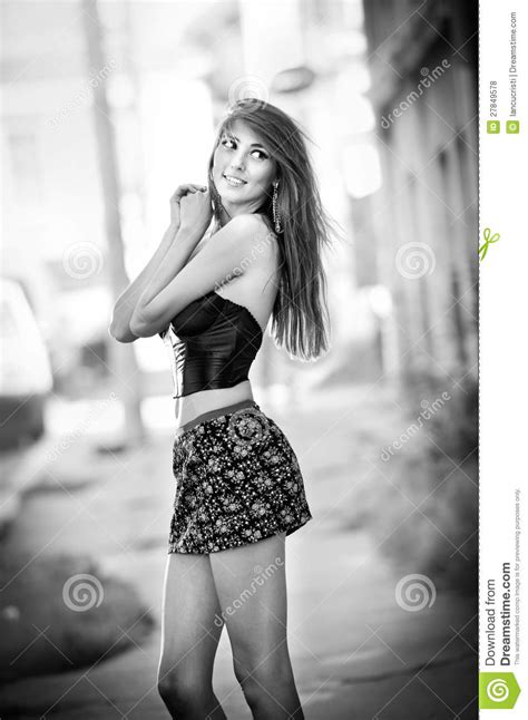 beautiful girl posing fashion near red brick wall royalty