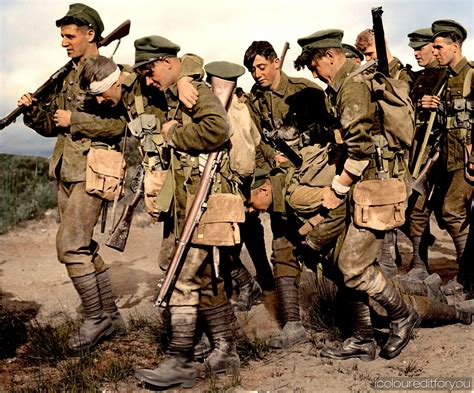british soldiers carrying  wounded comrades ca   colorized