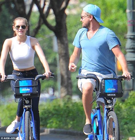 Leonardo Dicaprio Takes A Bike Ride With Mystery Blonde In