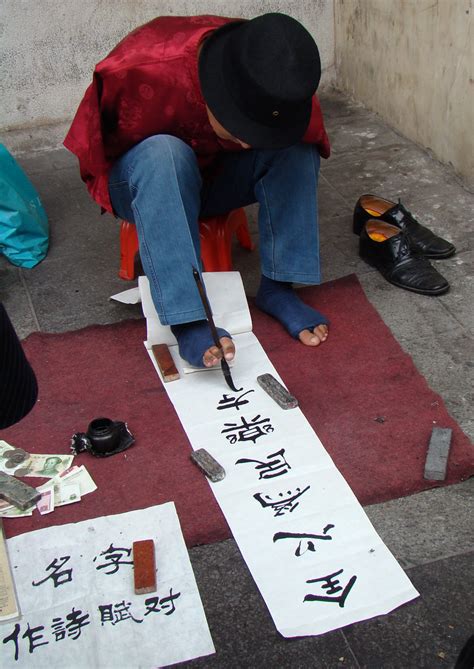 foot writing armless dude writing caligraphy   feet flickr