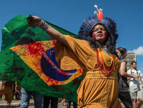 amazon burns brazils indigenous peoples rise  nationofchange