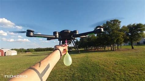 dropping water balloons   drone youtube