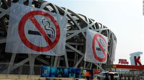 beijing rolls out china s toughest smoking ban cnn