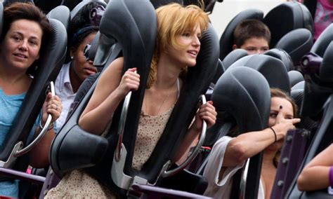 bella thorne enjoys a rollercoaster ride at co star s theme park