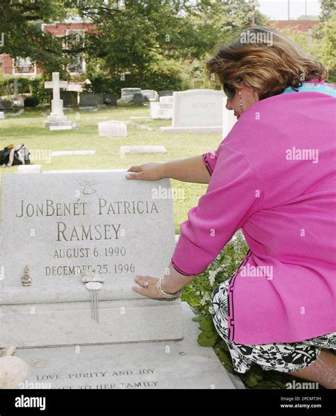 Patsy Ramseys Sister Paulette Davis Kneels By The Grave Of Jonbenet