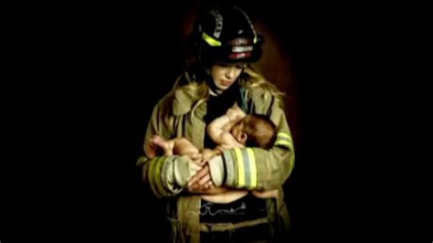 Firefighter In Hot Water Over Photo Of His Wife Breastfeeding In His