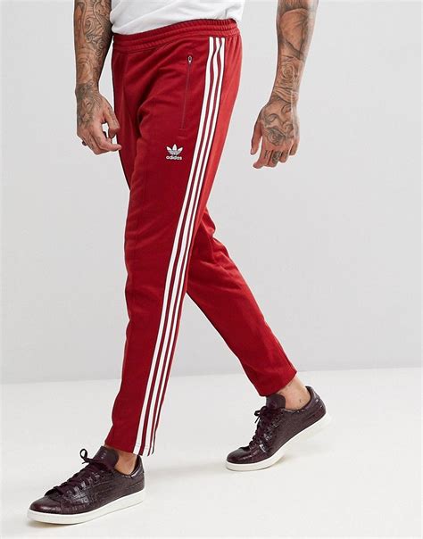 adidas originals adicolor beckenbauer sweatpants  skinny fit  burgundy cw red
