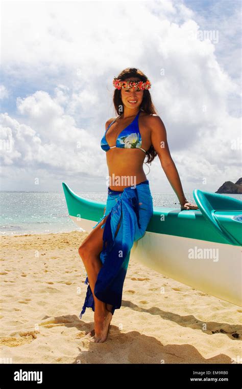 hawaii beautiful hawaiian girl wearing blue pareo  haku leaning