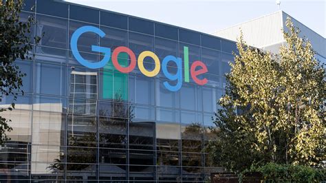alphabet googles parent company reports  drop  profit