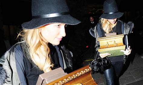 paris hilton baffles onlookers with mystery wooden chest daily mail online