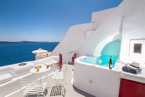 This Stunning Airbnb Is Carved Into A Cliff In Santorini Greece Cave