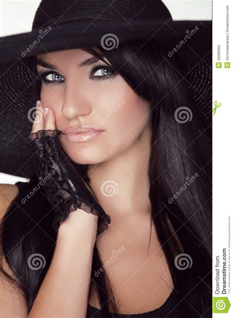 Elegant Lady Fashion Brunette Woman Model Posing In Black Hat I Stock