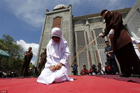 unmarried couples in aceh indonesia flogged for going on