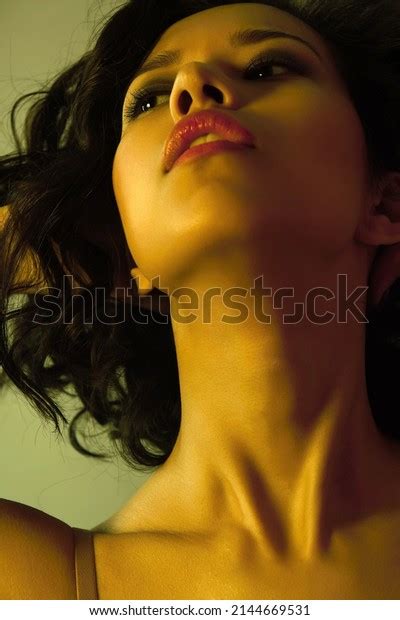 Beautiful Naked Girl Yellow Color Lights Foto Stock 2144669531