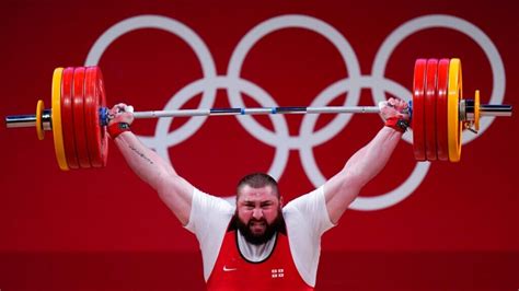 georgia weightlifter breaks world record  conquer mens super heavyweight class