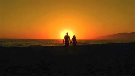 Couple Walk Off Into The Sunset To The Harmonious Tune Of Van Morrison
