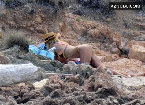 heidi klum topless at a beach in sardinia italy aznude