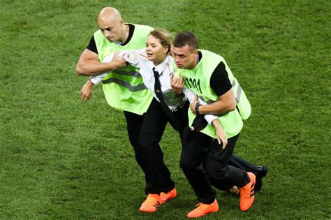 pussy riot members charged over world cup final pitch invasion world