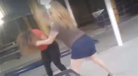 video woman brutally beats teenager in school gets arrested after