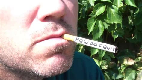 man swinging golf club with cigar in mouth smoke coming out and natural green ivy in