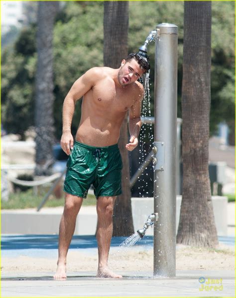 shirtless spencer boldman plays around in the pacific admits crush on