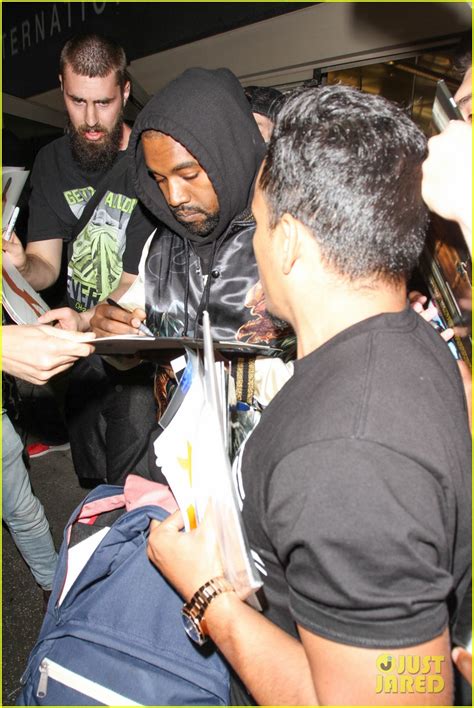 Full Sized Photo Of Kanye West Breaks Up Paparazzi Fight At Lax 20