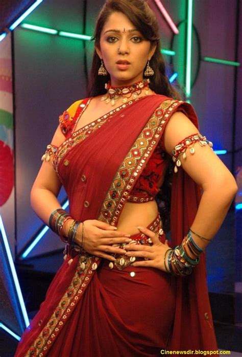 Cine News Actress Charmi Kaur Cute Stills In Saree Costume