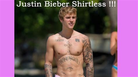 justin bieber takes a shirtless beachside stroll in