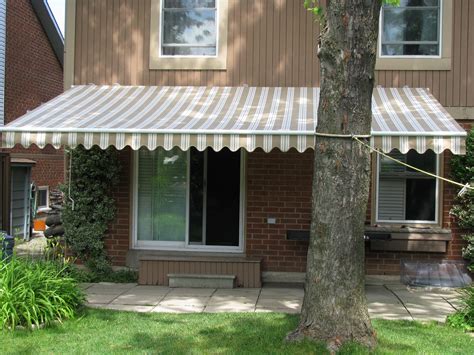retractable awnings big  small harmony    home landscaping retractable awning