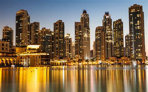 dubai golden reflections united arab emirates architecture buildings skyscrapers lights