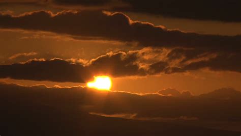 time lapse  sun rising  clouds close  stock footage video  shutterstock