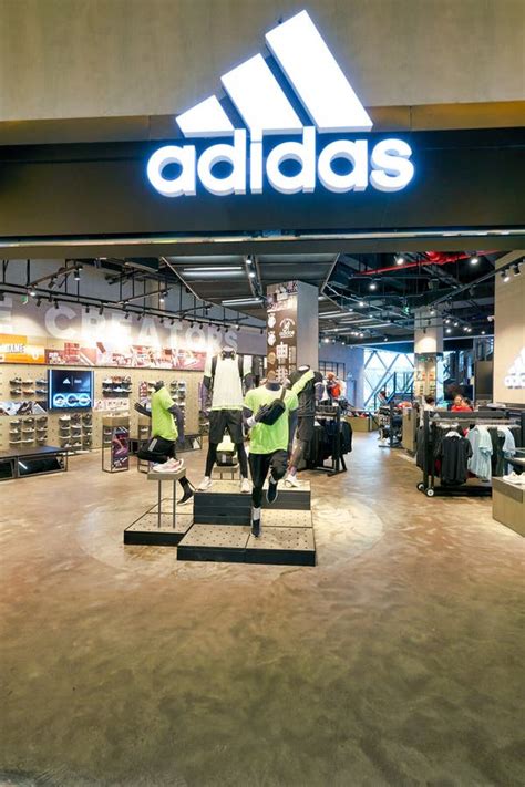 adidas store   town plaza shopping mall editorial photography image  girl mannequin