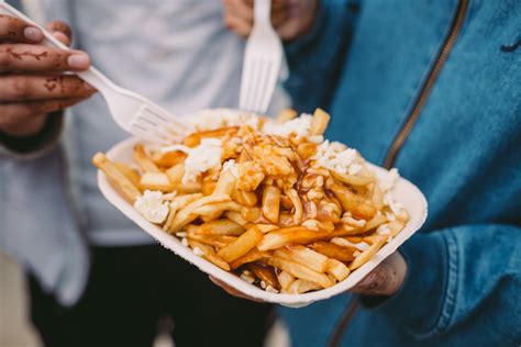 quebec cheesemakers push   official designation  poutine
