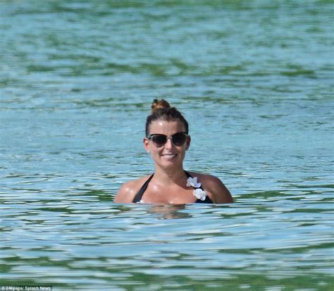 coleen rooney sports another swimwear look in bikini with floral detail