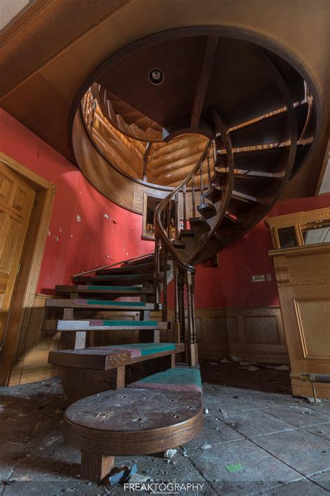 base   double helix staircase   beautiful abandoned log home mansion