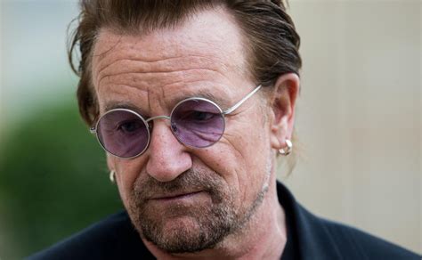 bono apologises after his charity is hit by bullying