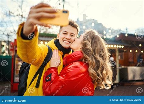 Young Romantic Couple In Love Making Selfie On Smartphone Smile To To