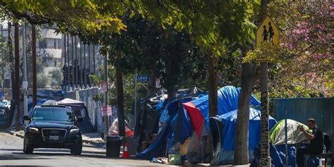 la city council greenlights ban on homeless encampments 500 feet from
