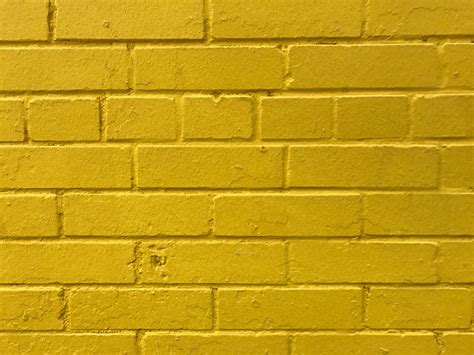 yellow bricks bricks yellow wall hd wallpaper wallpaper flare