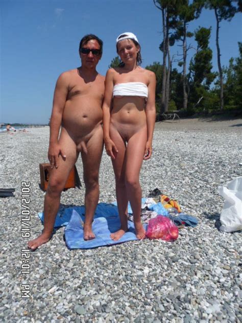 girl with small tits and shaved pussy with father with small shaved uncut cock on the nude beach