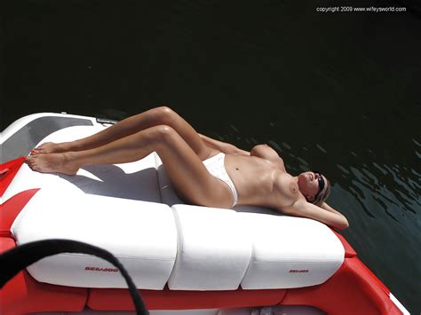 seductive milf in white bikini wifey having some fun outdoor