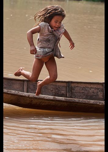 Lanten Girl Jumping Out Of Her Dugout Canoe On The Nam Ha  Flickr